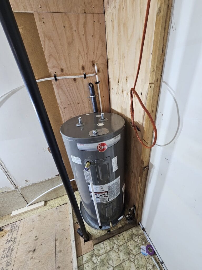 New water heater set in the utility closet